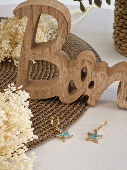 Notre Collection de Bijoux - Boucle d’Oreille Pendante Etoilé