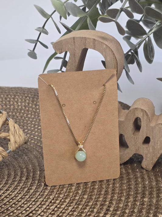 Notre Collection de Bijoux - Pendentif Boule Verte et Doré